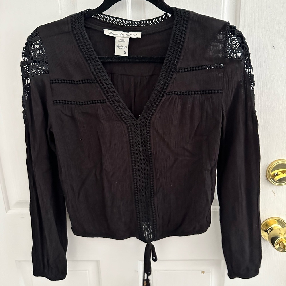 Cropped long sleeve top